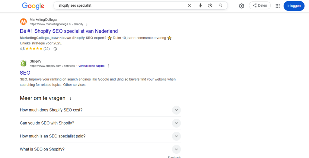 Google zoekresultaten voor shopify seo specialist met MarketingCollega op de eerste positie.